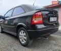 Черный Опель Астра, объемом двигателя 1.6 л и пробегом 240 тыс. км за 3589 $, фото 94 на Automoto.ua