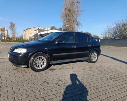 Черный Опель Астра, объемом двигателя 1.6 л и пробегом 250 тыс. км за 4000 $, фото 1 на Automoto.ua