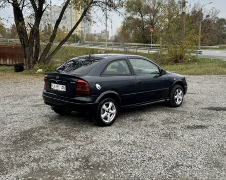 Черный Опель Астра, объемом двигателя 1.6 л и пробегом 258 тыс. км за 1350 $, фото 3 на Automoto.ua