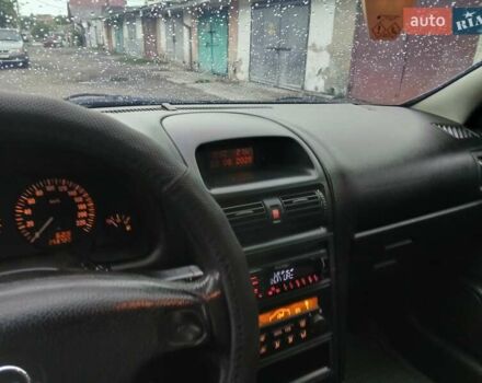 Черный Опель Астра, объемом двигателя 1.6 л и пробегом 240 тыс. км за 3589 $, фото 112 на Automoto.ua