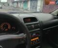 Черный Опель Астра, объемом двигателя 1.6 л и пробегом 240 тыс. км за 3589 $, фото 112 на Automoto.ua