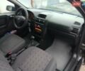 Черный Опель Астра, объемом двигателя 1.6 л и пробегом 240 тыс. км за 3589 $, фото 117 на Automoto.ua
