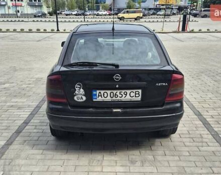 Черный Опель Астра, объемом двигателя 1.7 л и пробегом 296 тыс. км за 3600 $, фото 5 на Automoto.ua