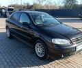Черный Опель Астра, объемом двигателя 1.6 л и пробегом 250 тыс. км за 4000 $, фото 1 на Automoto.ua