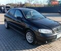 Черный Опель Астра, объемом двигателя 1.6 л и пробегом 265 тыс. км за 3000 $, фото 1 на Automoto.ua