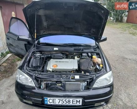 Черный Опель Астра, объемом двигателя 1.6 л и пробегом 240 тыс. км за 3589 $, фото 91 на Automoto.ua