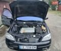 Черный Опель Астра, объемом двигателя 1.6 л и пробегом 240 тыс. км за 3589 $, фото 91 на Automoto.ua