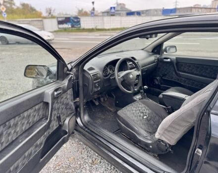 Черный Опель Астра, объемом двигателя 1.6 л и пробегом 258 тыс. км за 1350 $, фото 7 на Automoto.ua