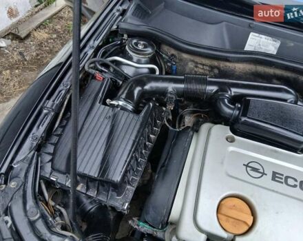 Черный Опель Астра, объемом двигателя 1.6 л и пробегом 240 тыс. км за 3589 $, фото 72 на Automoto.ua