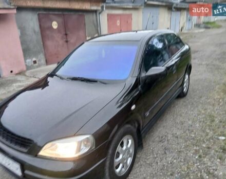 Черный Опель Астра, объемом двигателя 1.6 л и пробегом 240 тыс. км за 3589 $, фото 99 на Automoto.ua