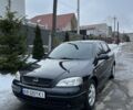 Черный Опель Астра, объемом двигателя 1.6 л и пробегом 202 тыс. км за 3650 $, фото 1 на Automoto.ua