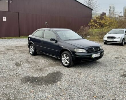 Черный Опель Астра, объемом двигателя 1.6 л и пробегом 258 тыс. км за 1350 $, фото 1 на Automoto.ua