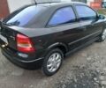 Черный Опель Астра, объемом двигателя 1.6 л и пробегом 240 тыс. км за 3589 $, фото 85 на Automoto.ua