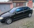 Черный Опель Астра, объемом двигателя 1.6 л и пробегом 240 тыс. км за 3589 $, фото 100 на Automoto.ua