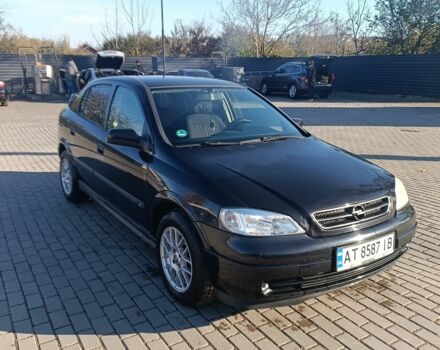 Черный Опель Астра, объемом двигателя 1.6 л и пробегом 250 тыс. км за 4000 $, фото 6 на Automoto.ua