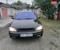 Черный Опель Астра, объемом двигателя 1.6 л и пробегом 240 тыс. км за 3589 $, фото 4 на Automoto.ua
