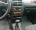 Черный Опель Астра, объемом двигателя 1.6 л и пробегом 240 тыс. км за 3589 $, фото 110 на Automoto.ua
