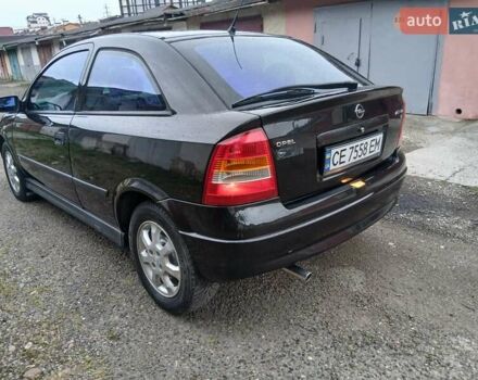 Черный Опель Астра, объемом двигателя 1.6 л и пробегом 240 тыс. км за 3589 $, фото 97 на Automoto.ua