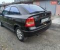 Черный Опель Астра, объемом двигателя 1.6 л и пробегом 240 тыс. км за 3589 $, фото 97 на Automoto.ua