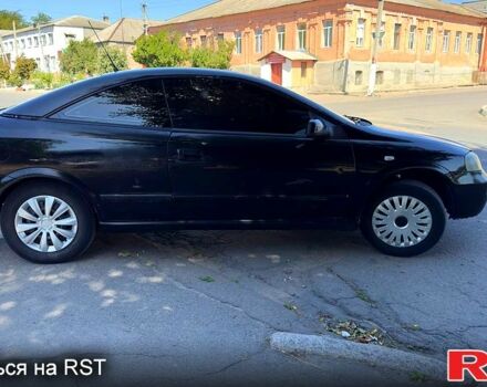 Черный Опель Астра, объемом двигателя 2.2 л и пробегом 200 тыс. км за 2500 $, фото 3 на Automoto.ua