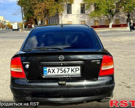 Черный Опель Астра, объемом двигателя 1.6 л и пробегом 256 тыс. км за 3000 $, фото 7 на Automoto.ua