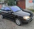 Черный Опель Астра, объемом двигателя 1.6 л и пробегом 240 тыс. км за 3589 $, фото 70 на Automoto.ua