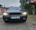Черный Опель Астра, объемом двигателя 1.6 л и пробегом 240 тыс. км за 3589 $, фото 69 на Automoto.ua