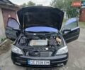 Черный Опель Астра, объемом двигателя 1.6 л и пробегом 240 тыс. км за 3589 $, фото 158 на Automoto.ua