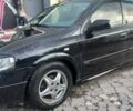 Черный Опель Астра, объемом двигателя 1.6 л и пробегом 2 тыс. км за 3025 $, фото 1 на Automoto.ua