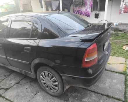 Черный Опель Астра, объемом двигателя 1.4 л и пробегом 200 тыс. км за 800 $, фото 4 на Automoto.ua
