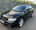 Черный Опель Астра, объемом двигателя 1.6 л и пробегом 218 тыс. км за 3500 $, фото 1 на Automoto.ua