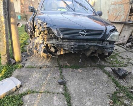 Черный Опель Астра, объемом двигателя 1.4 л и пробегом 200 тыс. км за 800 $, фото 2 на Automoto.ua