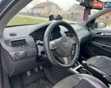 Черный Опель Астра, объемом двигателя 1.7 л и пробегом 270 тыс. км за 3499 $, фото 20 на Automoto.ua