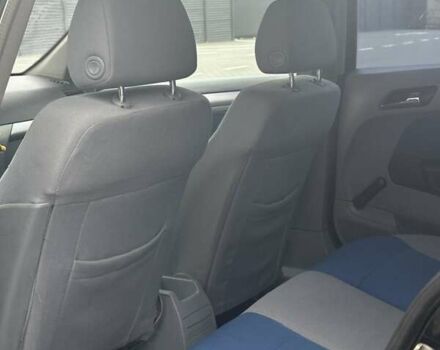 Черный Опель Астра, объемом двигателя 1.6 л и пробегом 273 тыс. км за 3250 $, фото 12 на Automoto.ua