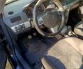 Черный Опель Астра, объемом двигателя 1.7 л и пробегом 200 тыс. км за 4200 $, фото 3 на Automoto.ua