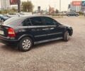 Черный Опель Астра, объемом двигателя 1.4 л и пробегом 180 тыс. км за 2600 $, фото 2 на Automoto.ua
