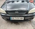 Черный Опель Астра, объемом двигателя 1.6 л и пробегом 240 тыс. км за 4000 $, фото 1 на Automoto.ua
