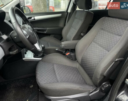 Черный Опель Астра, объемом двигателя 1.4 л и пробегом 212 тыс. км за 5200 $, фото 26 на Automoto.ua