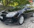 Черный Опель Астра, объемом двигателя 1.6 л и пробегом 243 тыс. км за 3850 $, фото 1 на Automoto.ua