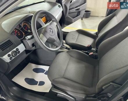 Черный Опель Астра, объемом двигателя 1.8 л и пробегом 210 тыс. км за 4800 $, фото 13 на Automoto.ua