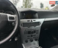 Черный Опель Астра, объемом двигателя 1.4 л и пробегом 212 тыс. км за 5200 $, фото 30 на Automoto.ua