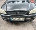 Черный Опель Астра, объемом двигателя 1.6 л и пробегом 240 тыс. км за 3500 $, фото 1 на Automoto.ua