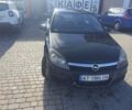 Черный Опель Астра, объемом двигателя 1.4 л и пробегом 250 тыс. км за 4000 $, фото 1 на Automoto.ua