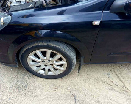 Черный Опель Астра, объемом двигателя 1.5 л и пробегом 210 тыс. км за 5000 $, фото 1 на Automoto.ua