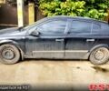 Черный Опель Астра, объемом двигателя 1.4 л и пробегом 300 тыс. км за 1900 $, фото 1 на Automoto.ua