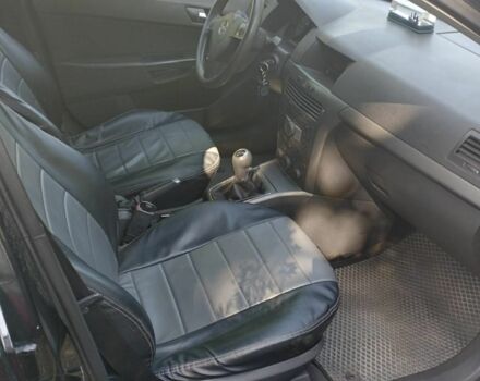 Черный Опель Астра, объемом двигателя 1.6 л и пробегом 265 тыс. км за 3999 $, фото 4 на Automoto.ua