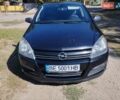 Черный Опель Астра, объемом двигателя 1.6 л и пробегом 270 тыс. км за 4200 $, фото 1 на Automoto.ua