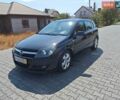 Черный Опель Астра, объемом двигателя 1.6 л и пробегом 230 тыс. км за 4999 $, фото 1 на Automoto.ua