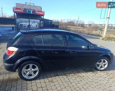Черный Опель Астра, объемом двигателя 1.4 л и пробегом 250 тыс. км за 4000 $, фото 2 на Automoto.ua