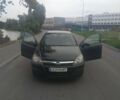 Черный Опель Астра, объемом двигателя 1.4 л и пробегом 238 тыс. км за 5000 $, фото 1 на Automoto.ua